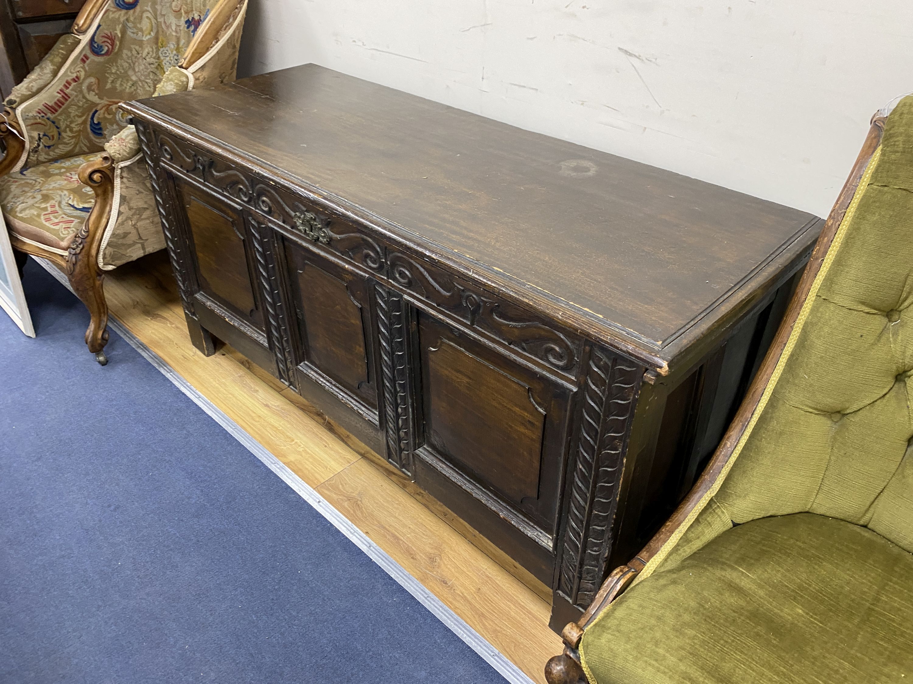 A 18th century style Cypriot carved wood panelled coffer, length 142cm, depth 51cm, height 67cm